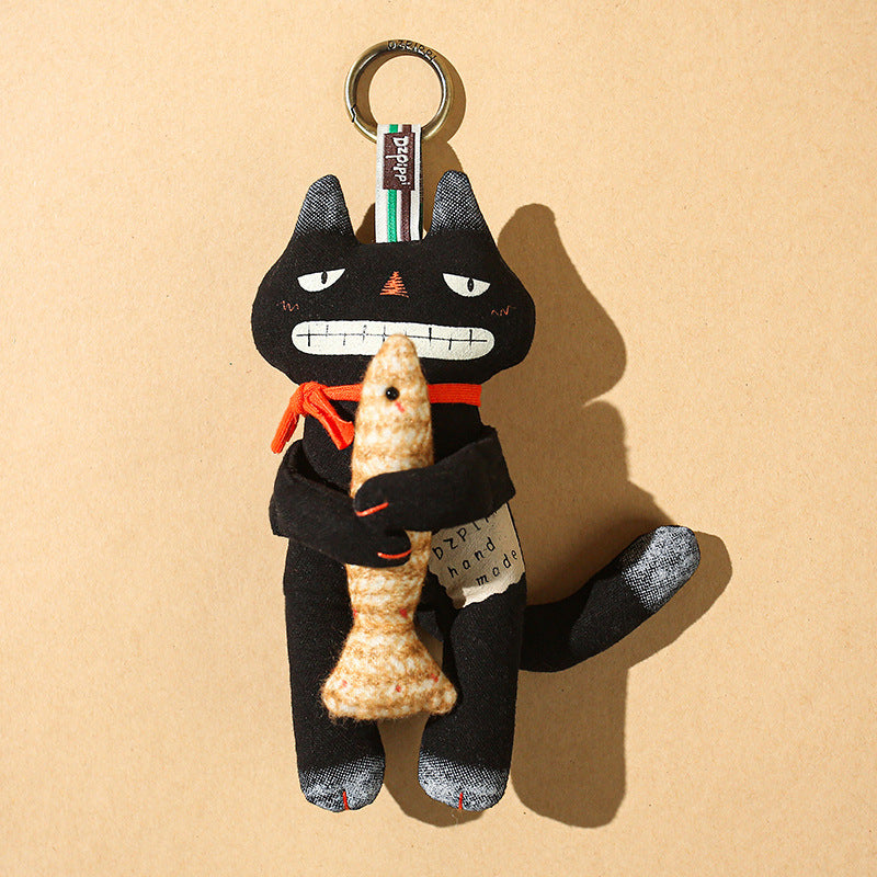 Black Cat Holding Fish Bag Charm – Cute Purse Accessory & Keychain