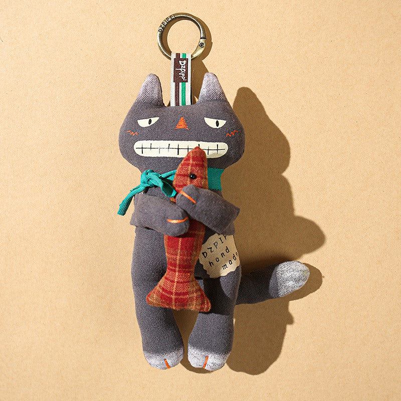 Black Cat Holding Fish Bag Charm – Cute Purse Accessory & Keychain
