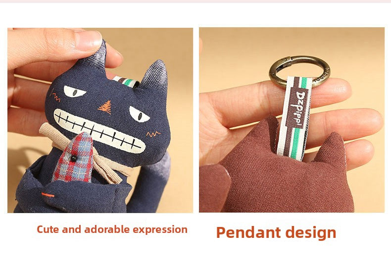  Close-up views showing the cute expression and golden keyring pendant design of the bag charm
