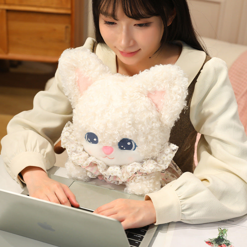 Cream curly bunny plushie sitting on office desk next to laptop, cute work from home companion gift for women