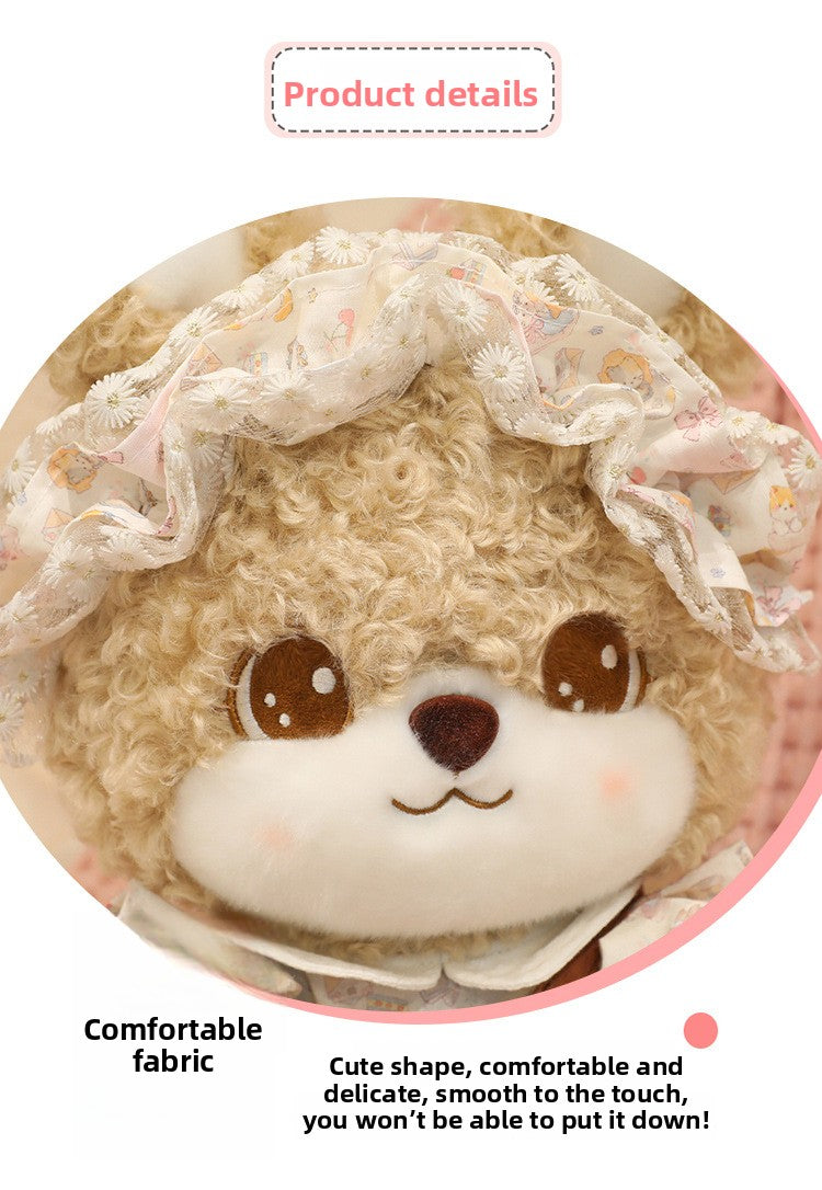 Close-up face of kawaii curly bunny plushie with big sparkly embroidered eyes, blush cheeks and daisy lace headband