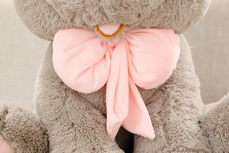 Pink bow detail on gray stuffed bunny plushie | soft plush fabric | cute bunny toy with pink inner ears