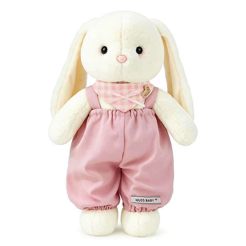 Cream white lop-eared stuffed bunny plush toy in pink overalls and checkered scarf, front view product shot